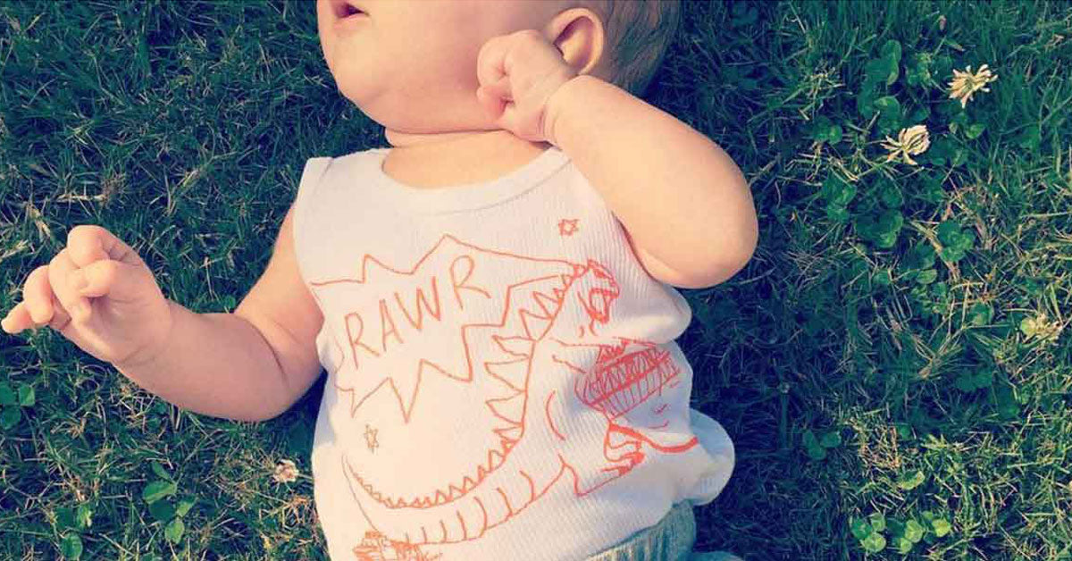 baby wearing godzilla rawr tank top