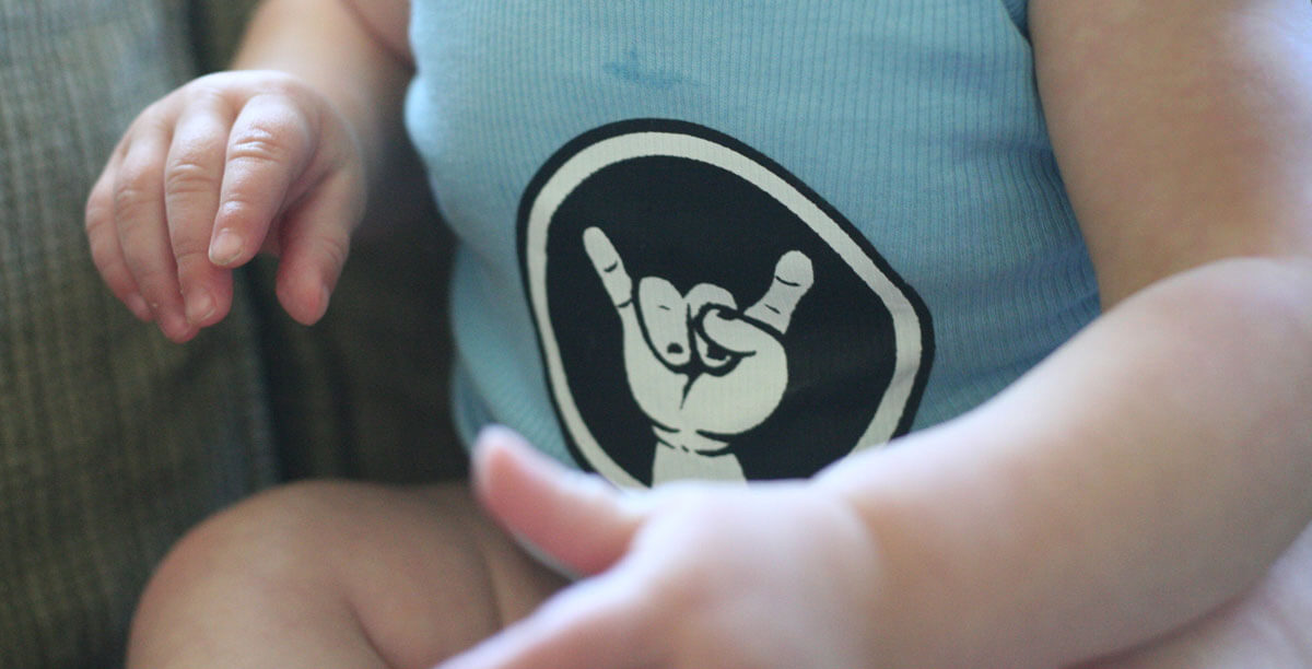 rocker symbol on baby